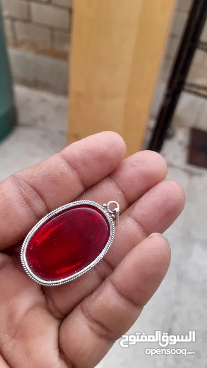 old red stone pendant