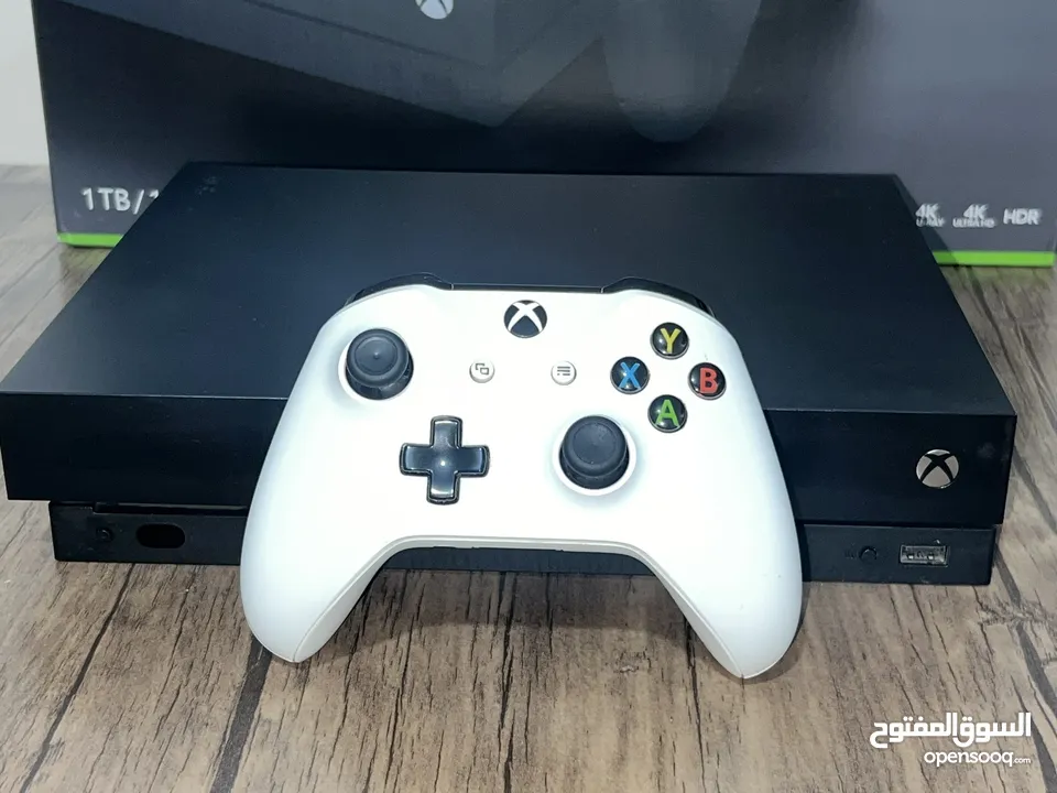 جهاز Xbox One X بحالة الجديد مع كرتونته