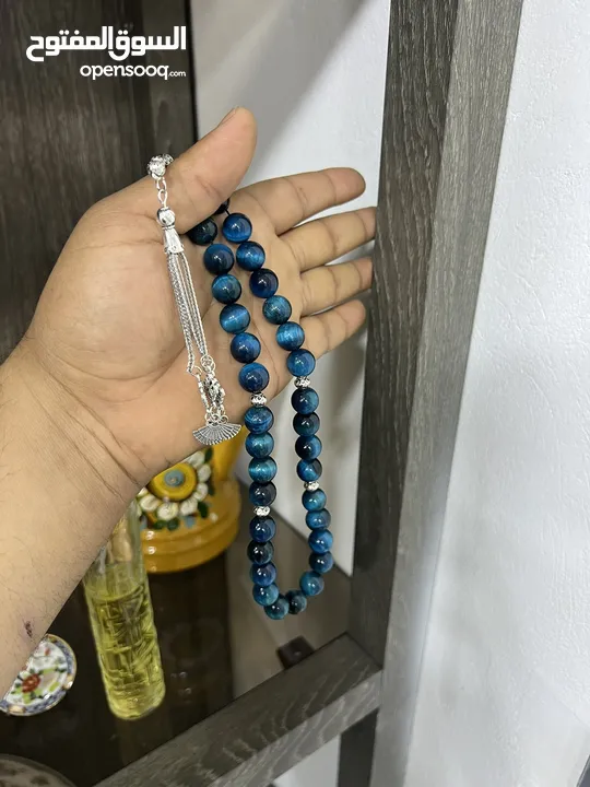 عرض خاص سبحه عين النمر ازرق او ذهبي بسعر حرق 33 حبة حلوة مش صغيرة للعلم مع طقم انتيومون مرتب