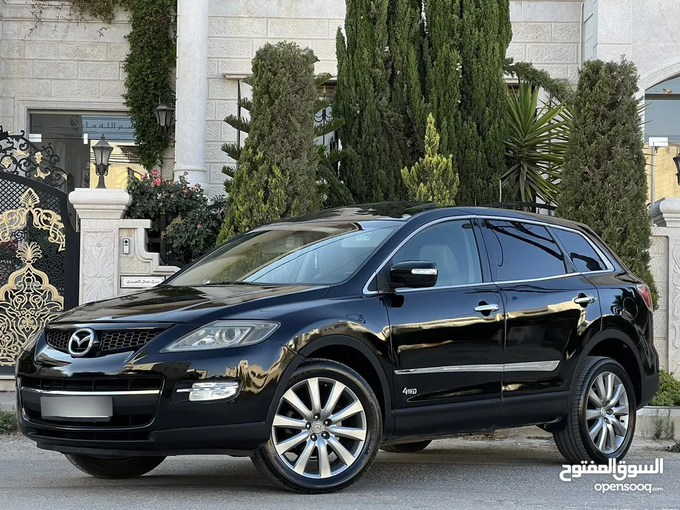 مازدا 7 ركاب بحالة الوكالة 2009 و بسعر مغري