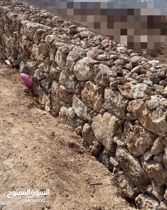 مقاولات بناء جدران حجر طلياني تبليط ساحات حجر  تعمير اراضي وتشييك وبناء جدران سلاسل حجرية