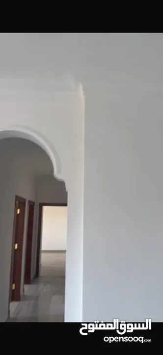 Excellent natural light and winds with views of Shafa Badran from the highest level in the building.