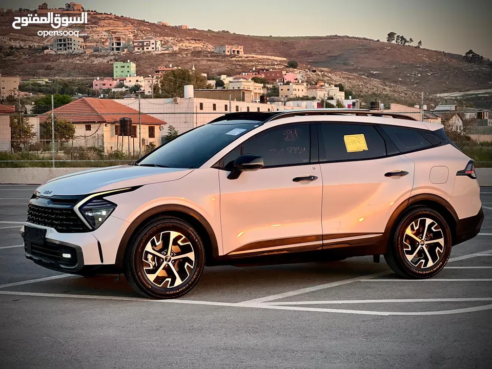 كايا سبورتاج /2022 فل الفل فتحة سقف  2x4 ///240Hp بنزين + كهرباء  ( Haybrid) 1600cc