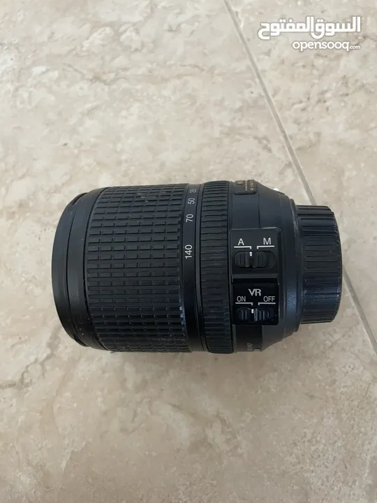 Nikon d5300 with 18-140mm lenses without lense cover like new نيكون d5300 مع عدسة 18-140مم شبه جديدة