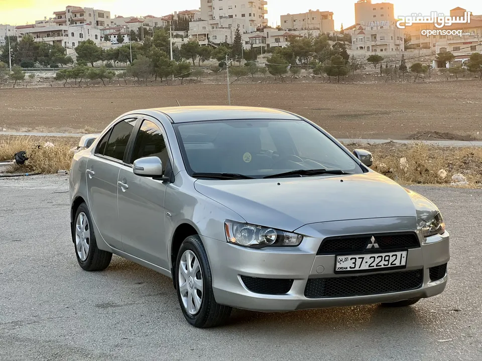 Lancer Ex 2015 كرررت ابيض  على وضع المصنع