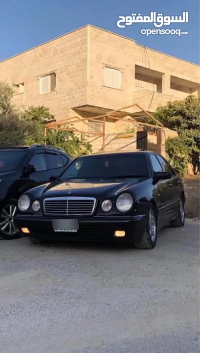 مرسيدس W210