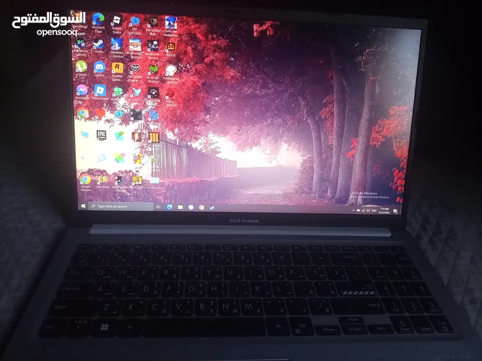 لاب توب مستعمل 5 اشهر ASUS Vivobook شبه جديد مع كرتونتو و شاحنو الأصلي