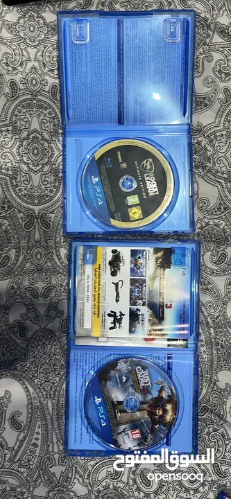 Ps4 with two controllers and 4 games including overwatxh ultimate edition