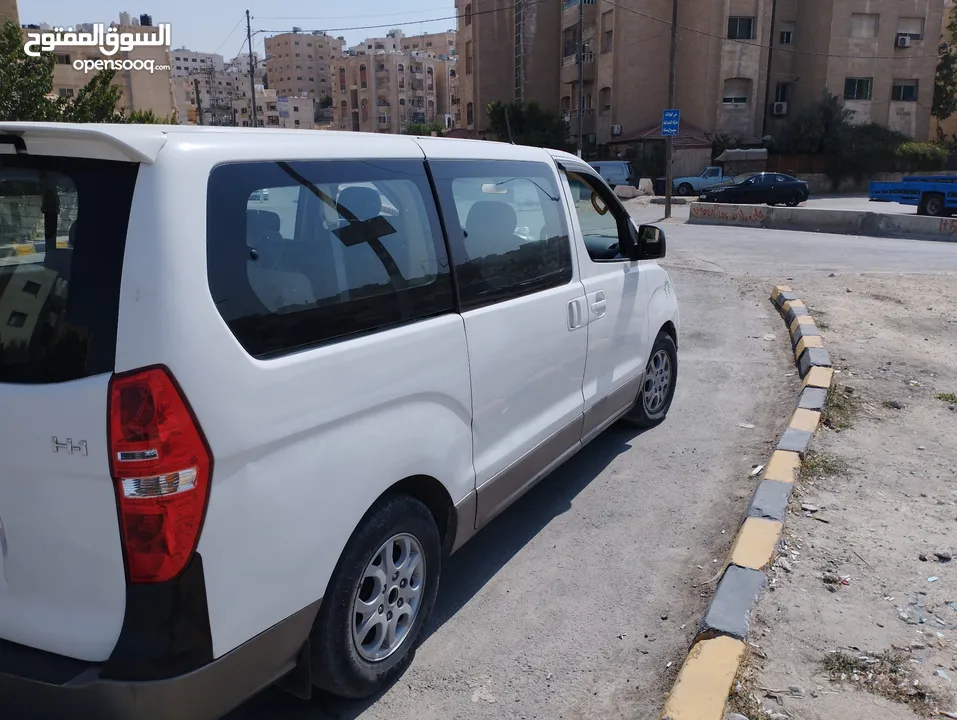 باص توصيل مطار جسر رحلات فان طلاب