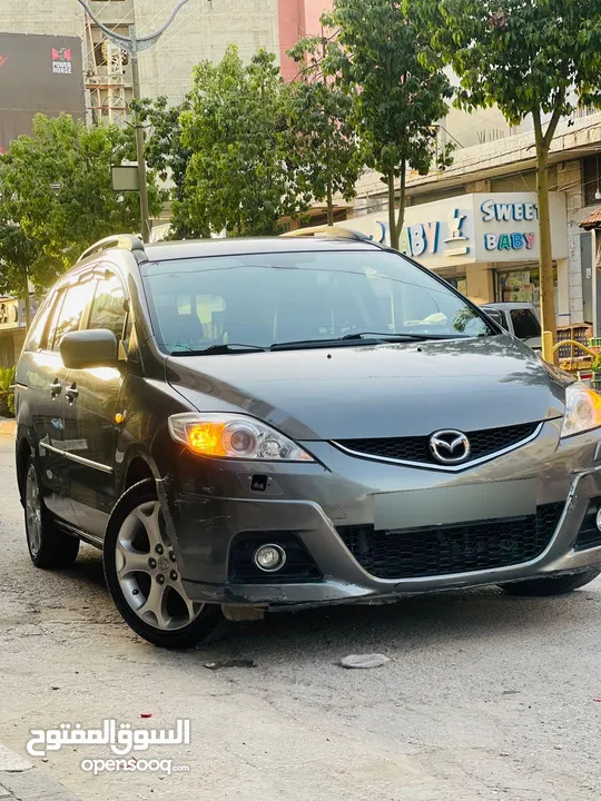 مازدا 5 ستيشن بابين سحاب ماتور 2000cc بدون تيربو هيك بجين هضول كراسي اماميات تدفئه كزاز كهرباء بنزين