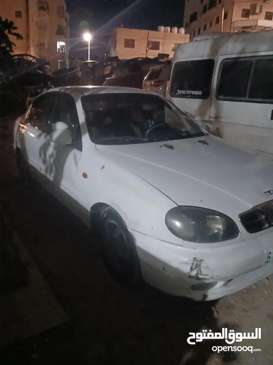 دايو لانوس نظيفة 2001 لونها أبيض للبيع
