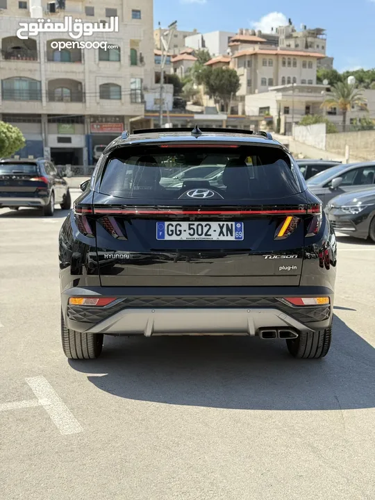 هونداي توسان ترخيص 2022 محرك 1600 هايبرد plug in/يقطع على الشحنه 65 كيلو متر