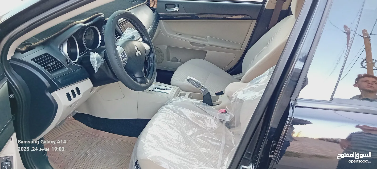 متسوبيشي لانسر فراشة موديل 2015 فحص مرفق مع الصور بحالة الوكاااااالة  ماشية 49 الف km  أصلي