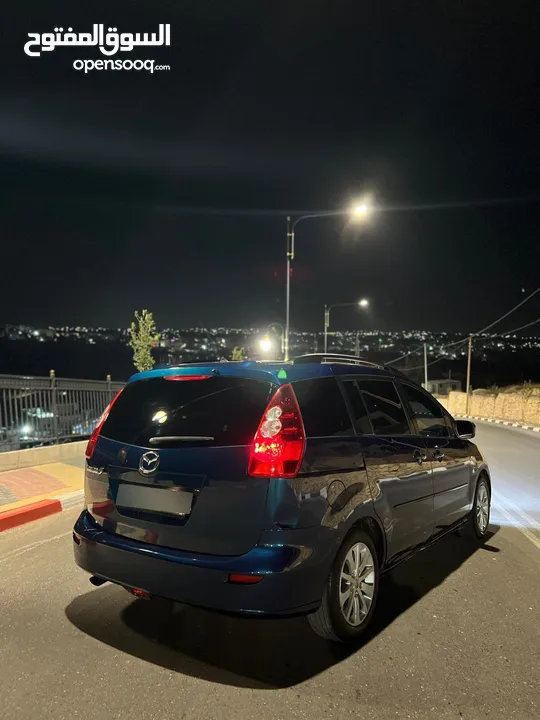 مازدا 5 جير عادي 6+1 متور 2000 بنزين رخصه و تامين جديد  عداد قليل فحص نخبب سعرر كااششش