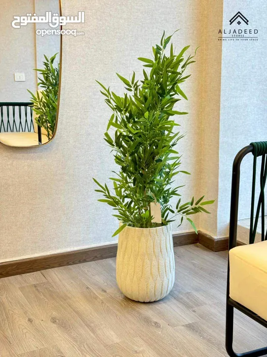 أشجار وقوارير صناعيه  بتقدروا تختاروا الشجره والقوار اللي بيناسبكم