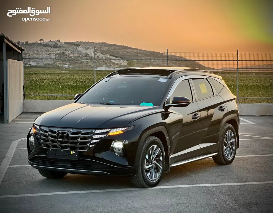 هونداي توسان/2022 فل الفل فتحة سقف بانوراما  2x4 ///240Hp بنزين + كهرباء  ( Haybrid) 1600cc