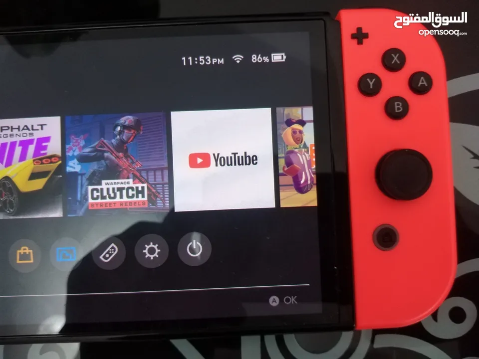 Nintendo Switch OLED - جهاز الألعاب المتطور مع شاشة OLED رائعة، أداء استثنائي وقابلية توسيع الذاكرة