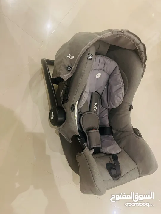 Joie car seat 1st stage , from new born to 13 kg , gray color , used in a very good condition