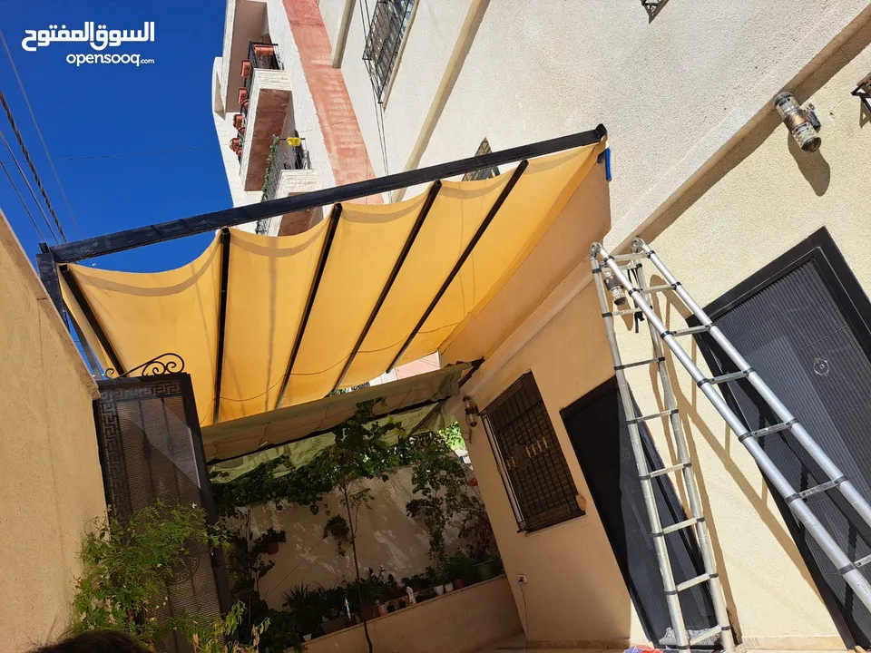 مظلة متحركة سحاب فتح و اغلاق يدوي