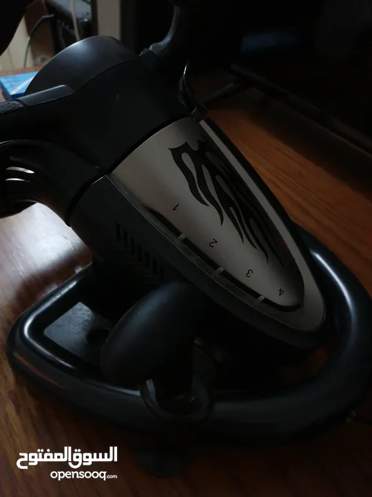 a pxn simulator pack with a steering wheel and a pedals with a gear shifter