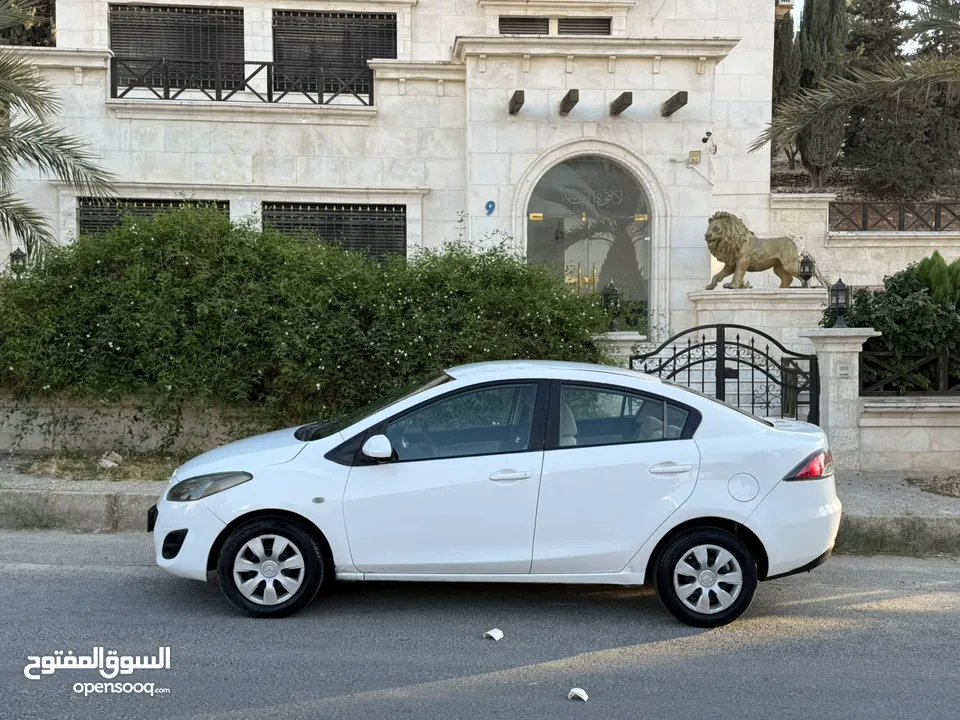 مازدا زوم 2 موديل 2012 فحص كامل 7 جيد ولا ملاحظة لون ابيض قاطعة مسافة 100 الف كيلو فقط (استخدام شخصي