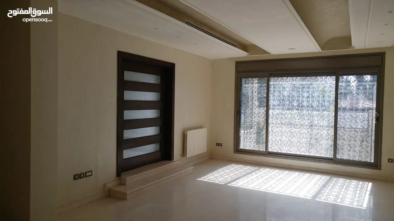 قطعة ارض 716م2 عليها عمارة اربعة طوابق وقبو في الصويفية
