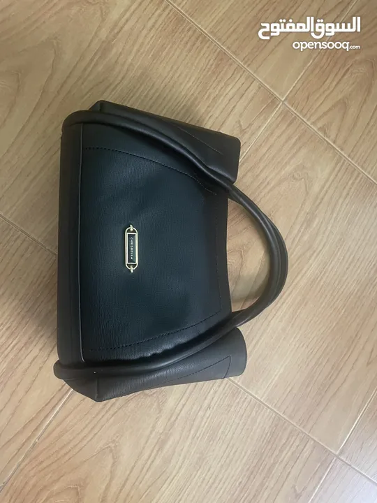 chris bella black leather purse for women. شنتة/شنطة/حقيبة كريس بيلا جلد اسود نسائية حجم كبير جديدة