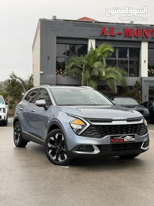 كيا سبورتاج ترخيص 2022 محرك 1600 هايبرد plug in/يقطع على الشحنه 65 كيلو متر