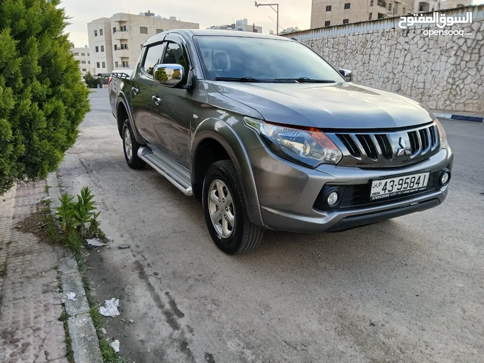 متسوبيشي l200 2018 بحالة الوكالة فحص كامل بدون ملاحضات وفل كامل بدون جير ماشي 60000