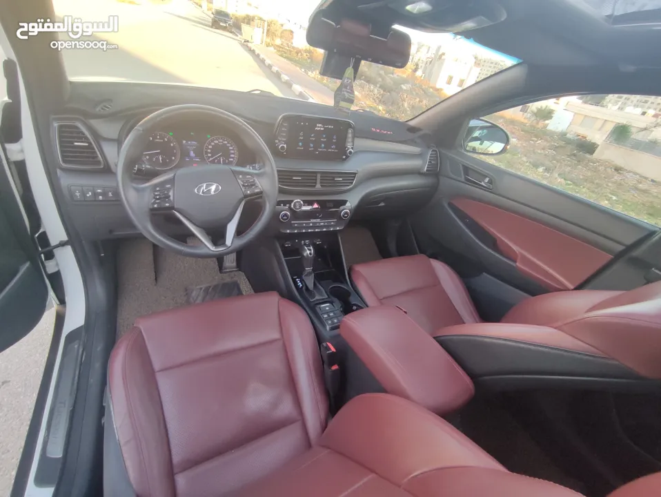 هونداي توسان فل الفل اضافات دهان شركة وعداد أصلي 70000كم فقططط رخصة وتأمين شامل للبيع بسعر مغري