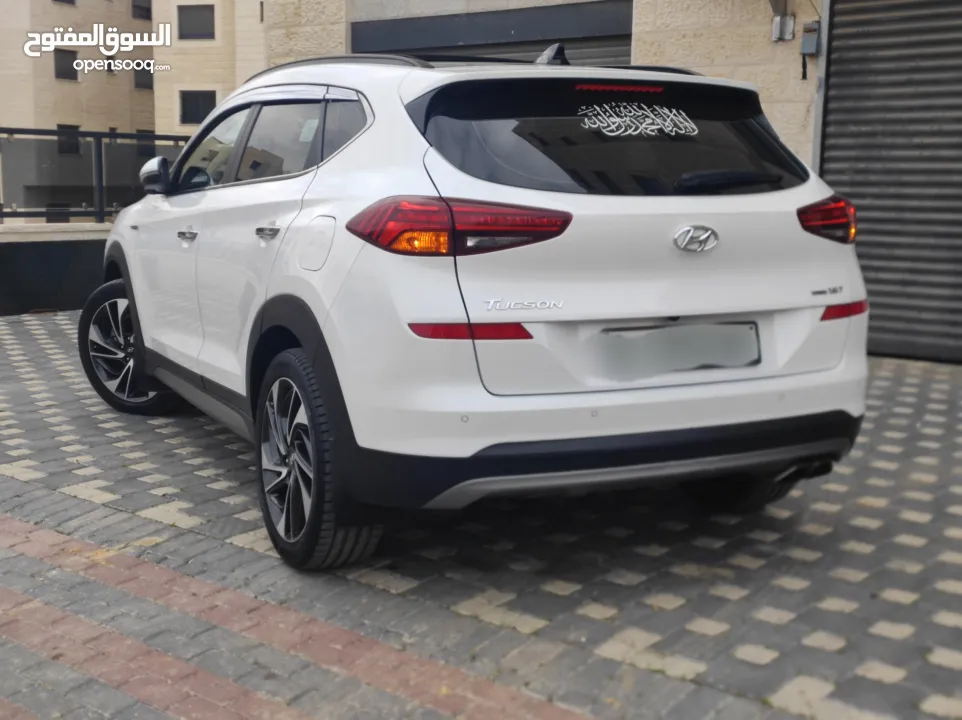 هونداي توسان فل الفل اضافات دهان شركة وعداد أصلي 70000كم فقططط رخصة وتأمين شامل للبيع بسعر مغري