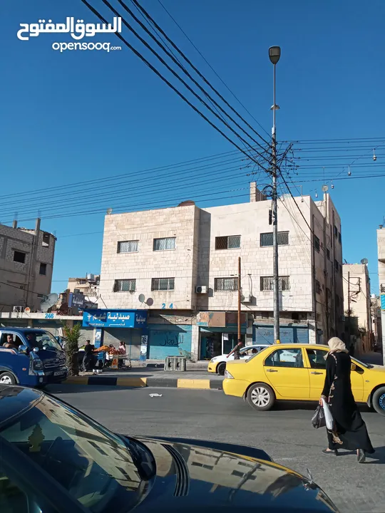مجمع تجاري للإيجار بدون خلو في موقع مميز في الزرقاء حي معصوم الشارع الرئيسي جوار دوار معصوم