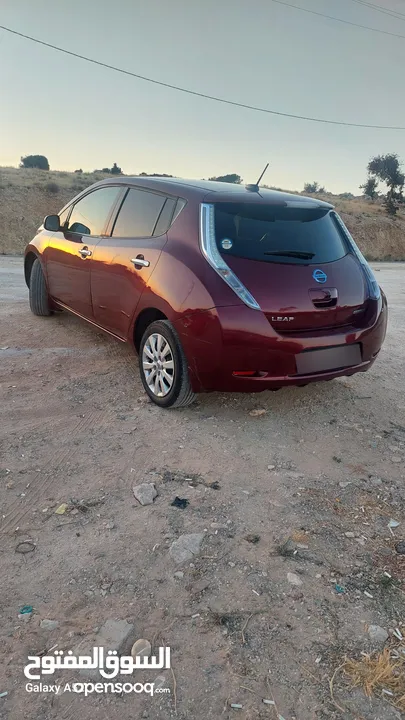 نيسان ليف2015 مدخلين شحن فحص مرفق بالصور ترخيص ترخيص طويل 9 بار اصلي
