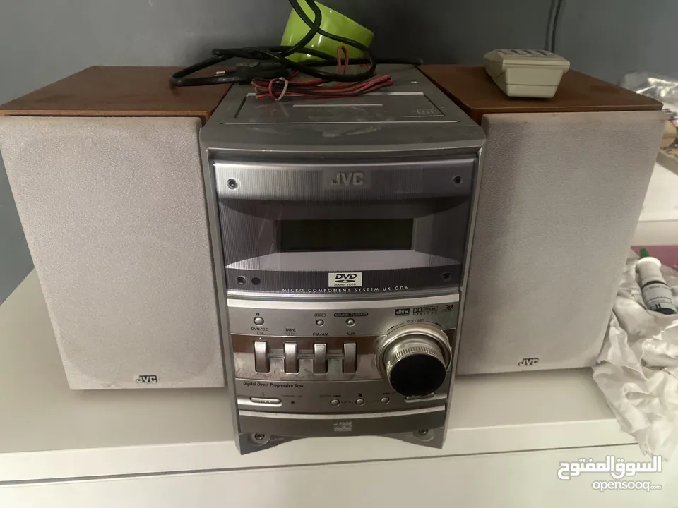 جهاز ستيريو DVD مع راديو ومشغل أقراص سي دي واشرطه عاديه القديمه مستعمل بحالة الوكاله