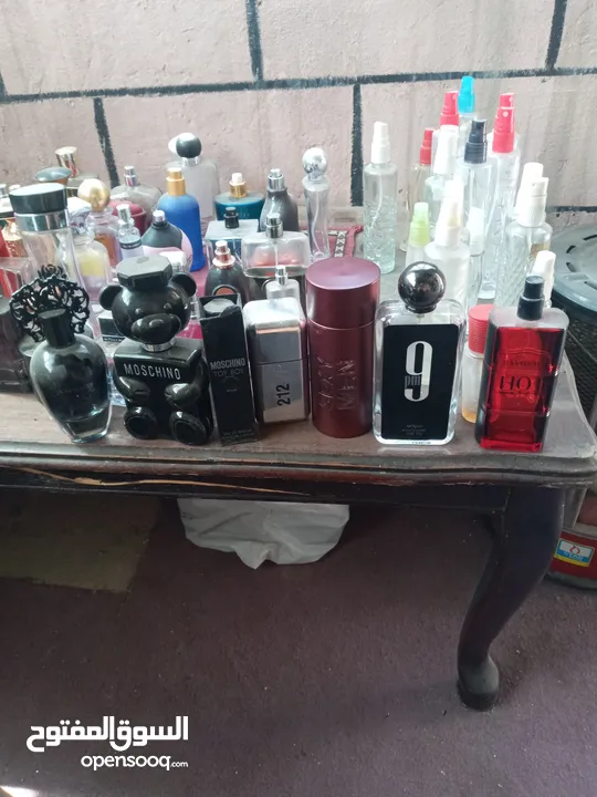 60 زجاجة عطر فارغه ....انواع مختلفه وماركات معروفه
