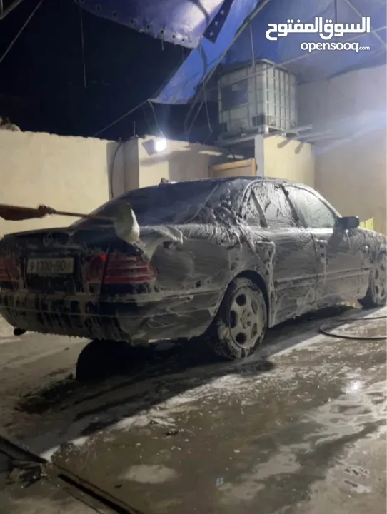 مرسيدس W210