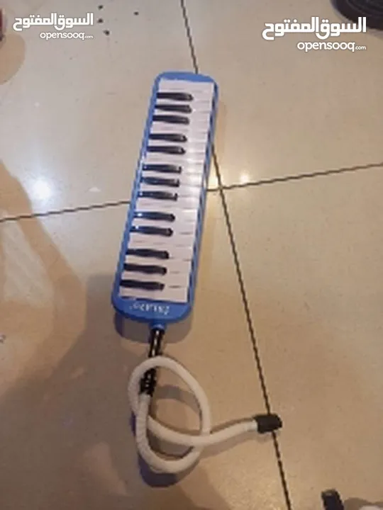 ميلوديكا مع شنتة والعدة