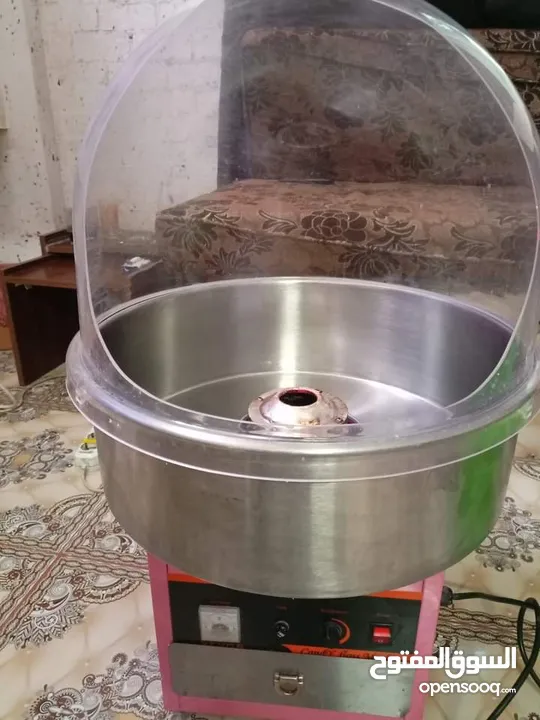 ماكنة غزل بنات مع مكبس كاسات استعمال بسيط مشروع كامل ودخل ممتاز سبب البيع السفر