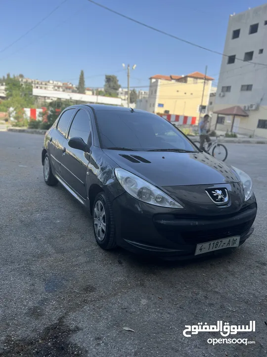 بيجو 206 تللت
