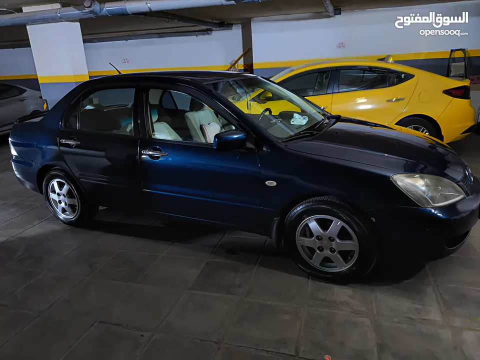 متسوبيشي لانسر GLX 2007 1600 cc وارد الخليج الكويت جميع الإضافات بإستثناء الفتحه وجنط إضافي.