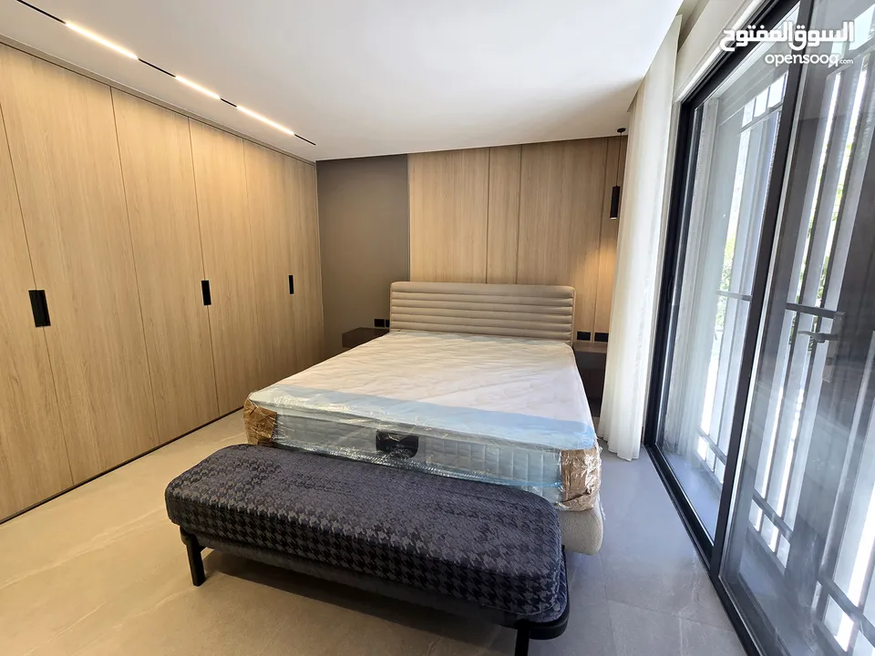 ارقى مناطق ام اذينة شقة مفروشة فخمة مع حديقة واسعة وكراج خاص LUXURY APARTMENT