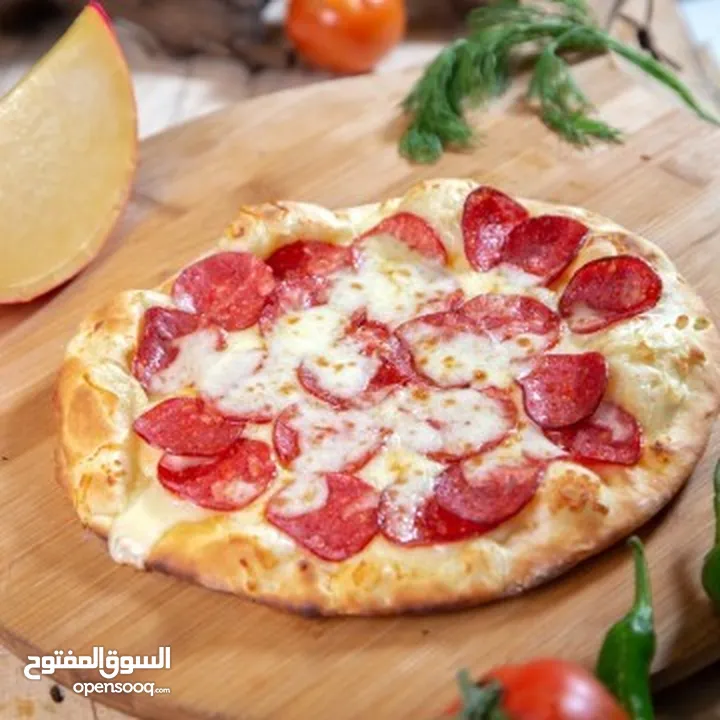 محل بيتزا ومعجنات وسناك للبيع بسعر مغري