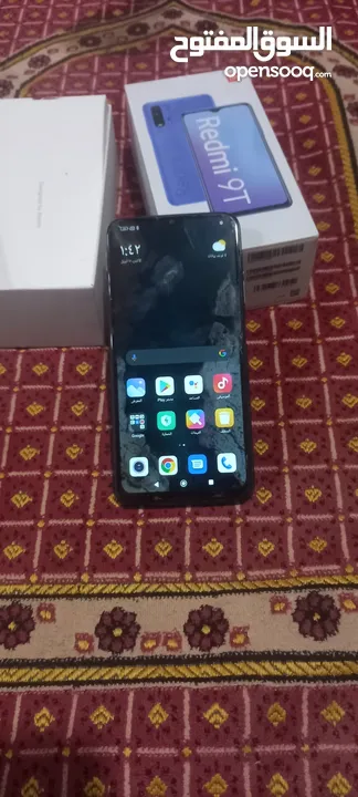 تلفون Realme  9T مساحه 128 رام 6 معاها الكرتونه والضمان البطاريه 6000مللي امبير. 18 فلت تدعم الشحن ا