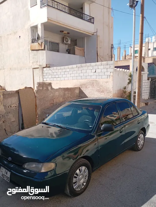 هونداي اكسنت توماتيك اصلي موديل 95 مكيف ثلاجه ترخيص شهر 3/2026 سياره زي ما بالصور واحلى