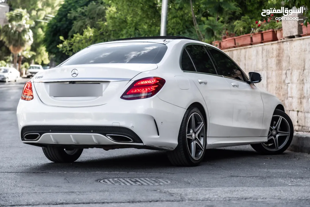 Mercedes C200 Amg kit 2015 مميزة جدا،  وارد و بحالة الوكالة