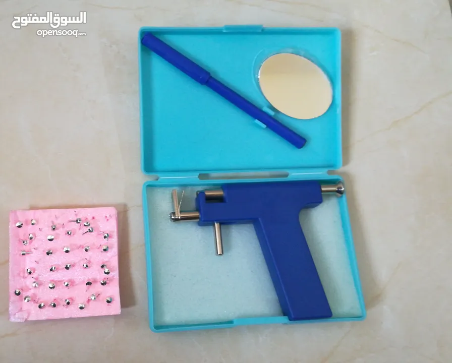 اداة ثقب الاذن لوضع حلق مثقب اذن و انف اكسسوارات