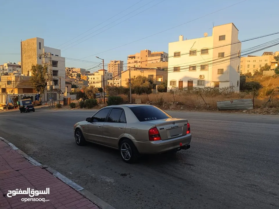 مازدا 323 تحفه لعبه نخب أول  نقدا البدل وارد منبدل
