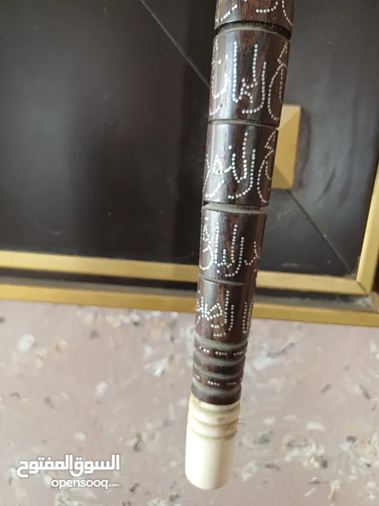 عكاز ابأنوس مرصعه بأسماء الله الحسنى فضه مخزنه