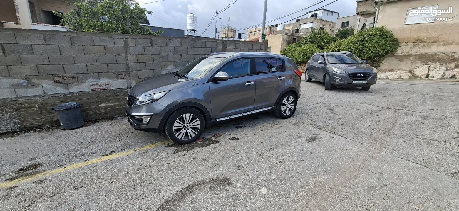 جيب كاياسبورتاج موديل 2014-اتومتيك'دفع 4×4 ماتور 2000ديزل فل فل اضافات ماعد الفتحة - نظيف من الاخر