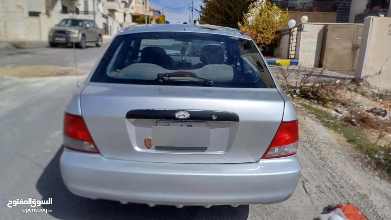 اكسنت موديل 2001 قصة الفيرنا(كوبيه_بابين_خمس مقاعد) اتومتيك_محرك1600cc